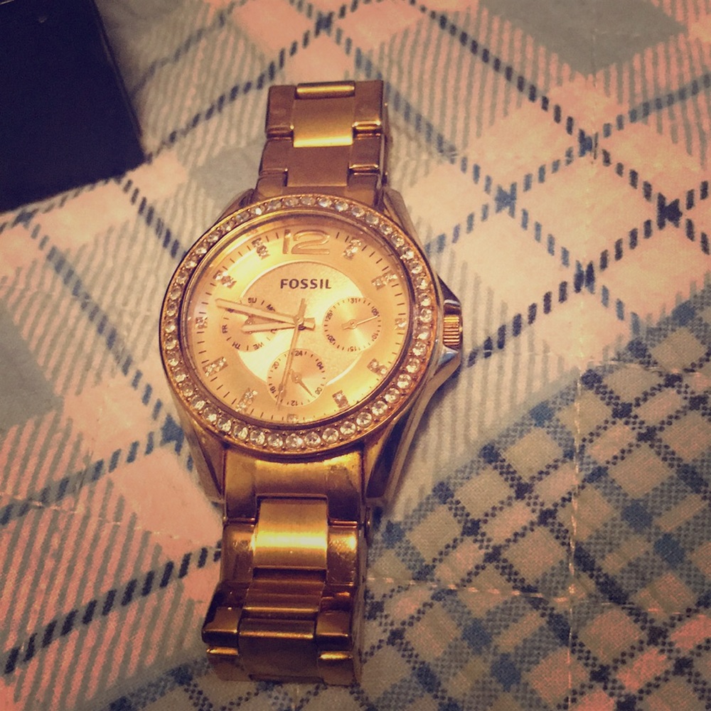 Gold fossil watch